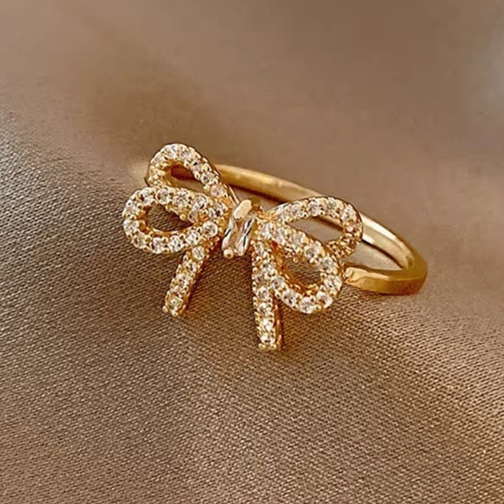 Charming Gold Ribbon Bow Ring – Adjustable Sparkle Style